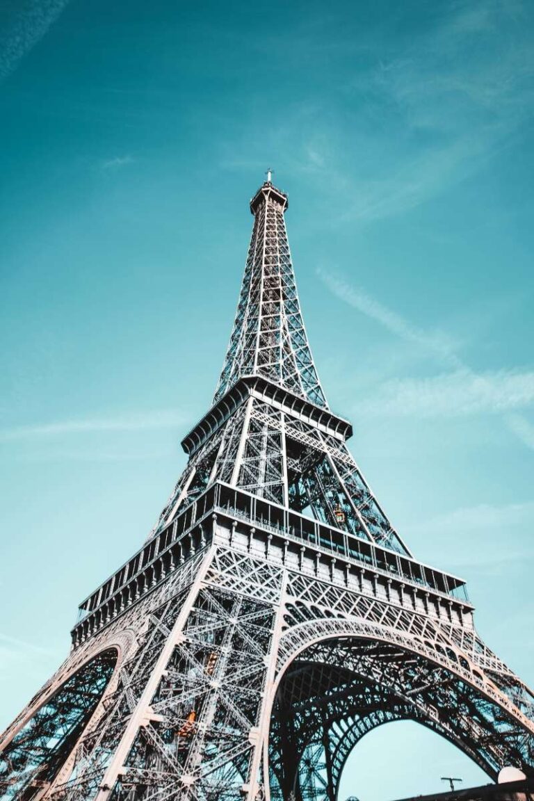 Eiffel Tower against a bright blue sky