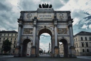 The Siegestor (Victory Gate) in Munich with cloudy skies overhead