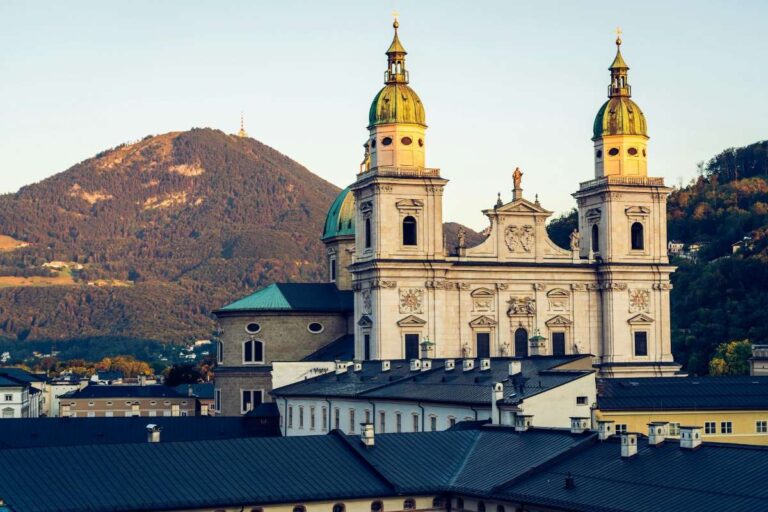 The twin towers of a historic castle in Salzburg, Austria