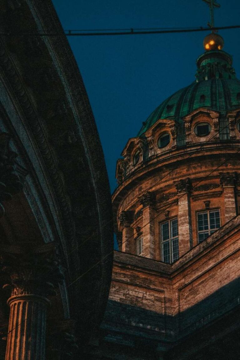 Close-up of Berlin Cathedral's ornate dome against the night sky