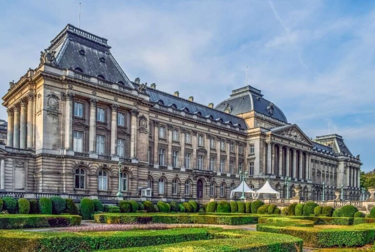 Royal Palace of Brussels with manicured gardens in fron