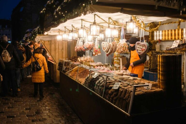 Christmas market stall selling gingerbread and festive treats in Nuremberg