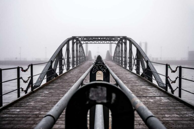 Foggy view of a pedestrian bridge over the Elbe in Hamburg