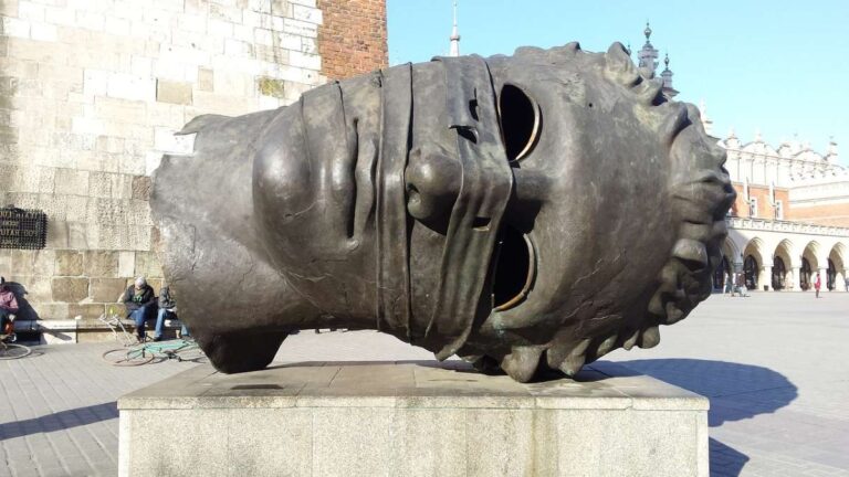 Close-up of Eros Bendato sculpture in Krakow