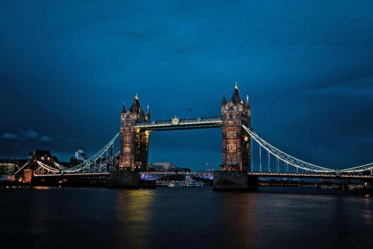 Illuminated Tower Bridge over the River Thames at night in London