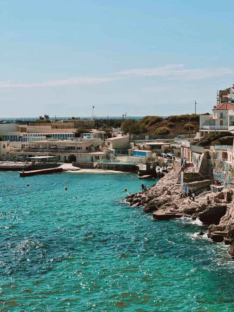 Rocky beach in Marseille with clear blue water