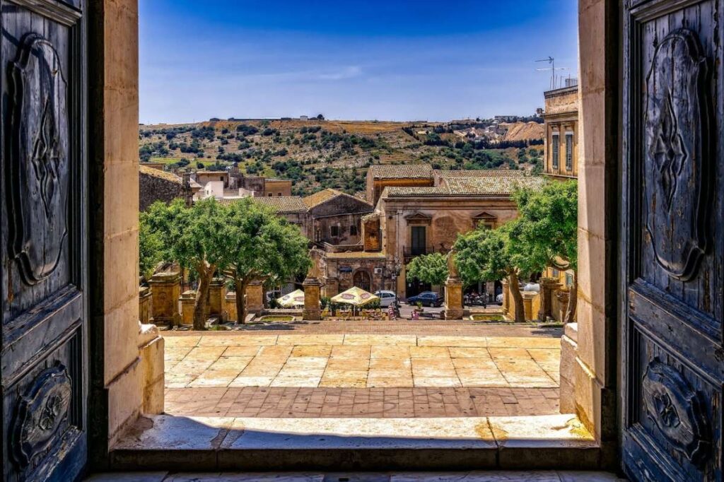 View of Modica Cathedral and surrounding town from a high vantage point