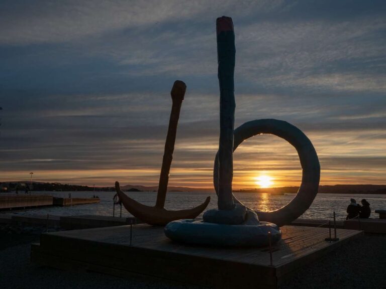 Sunset view with sculptures by the beach in Oslo