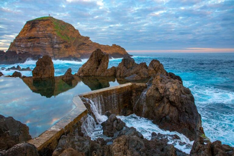 Dramatic cliffs and ocean waves at a Porto beach