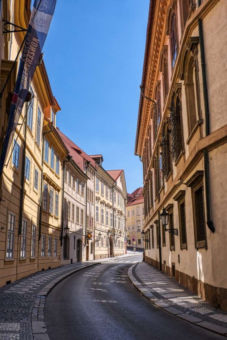 Narrow cobblestone street in Prague's historic town center