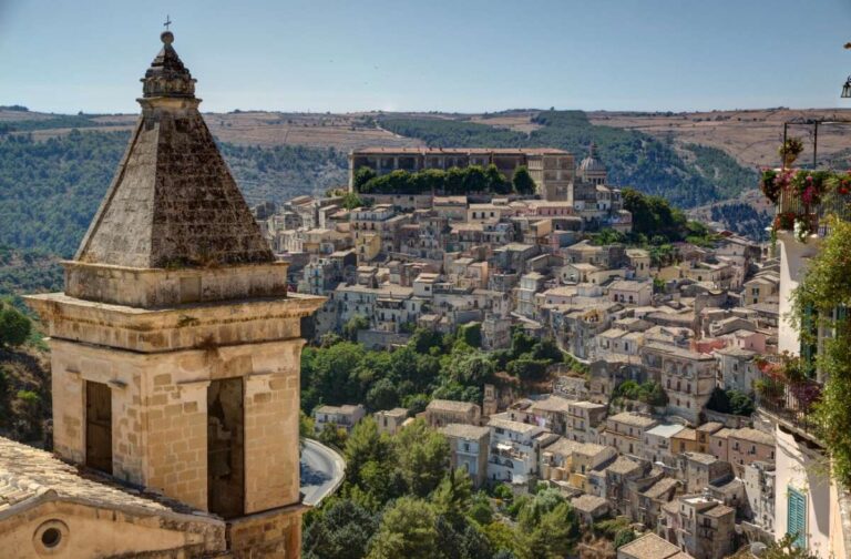 Panoramic view of Ragusa with a church tower in the foreground