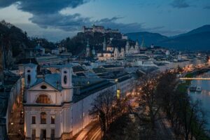 castle of Salzburg on the top of a mountain by night