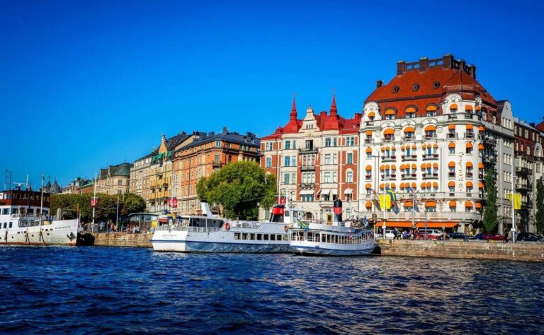 River view in Stockholm to houses and boats along the river walk