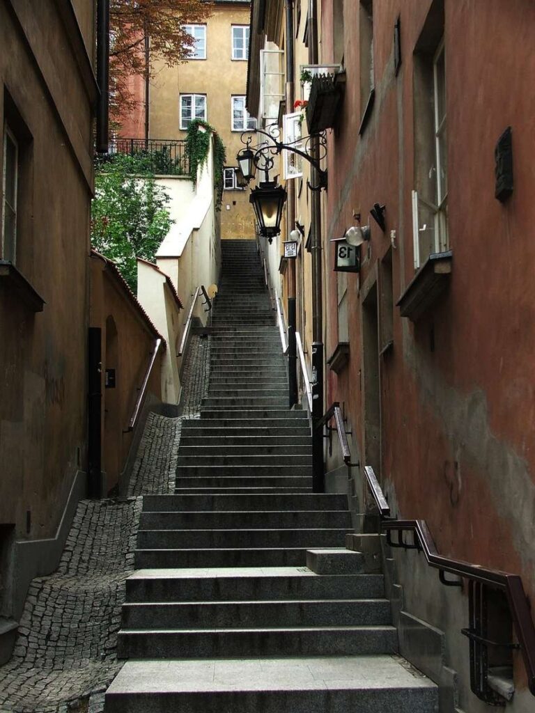 Narrow stone staircase in Warsaw's historic Old Town