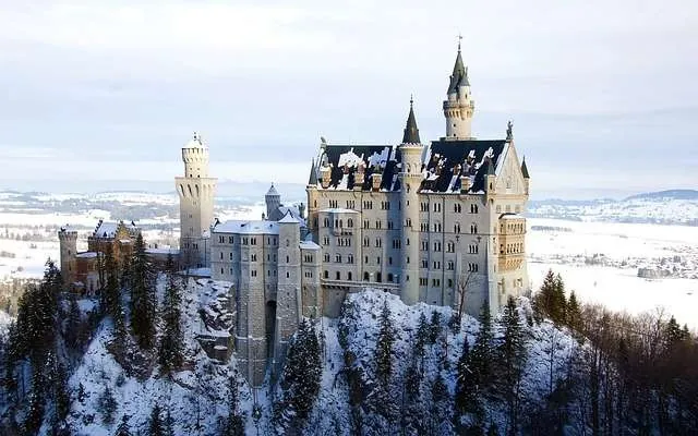 Neuschwanstein Castle in winter, surrounded by snow