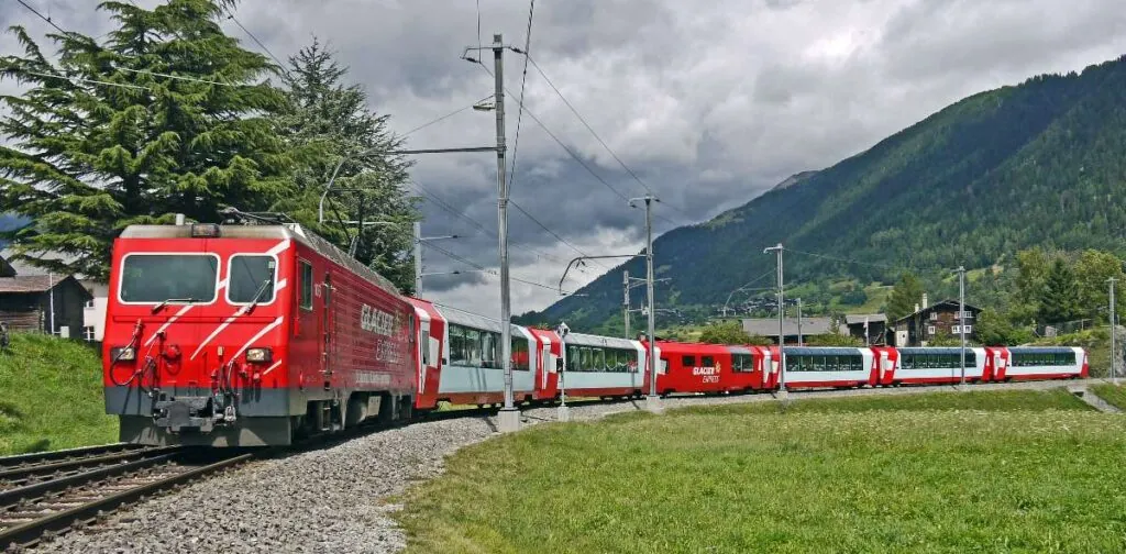 Famous Glacier Express Train in Switzerland through impressive scenary and mountains